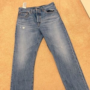 Levi’s 501 women’s jeans. Slight distress, rarely worn. 30 waist, 32 length.